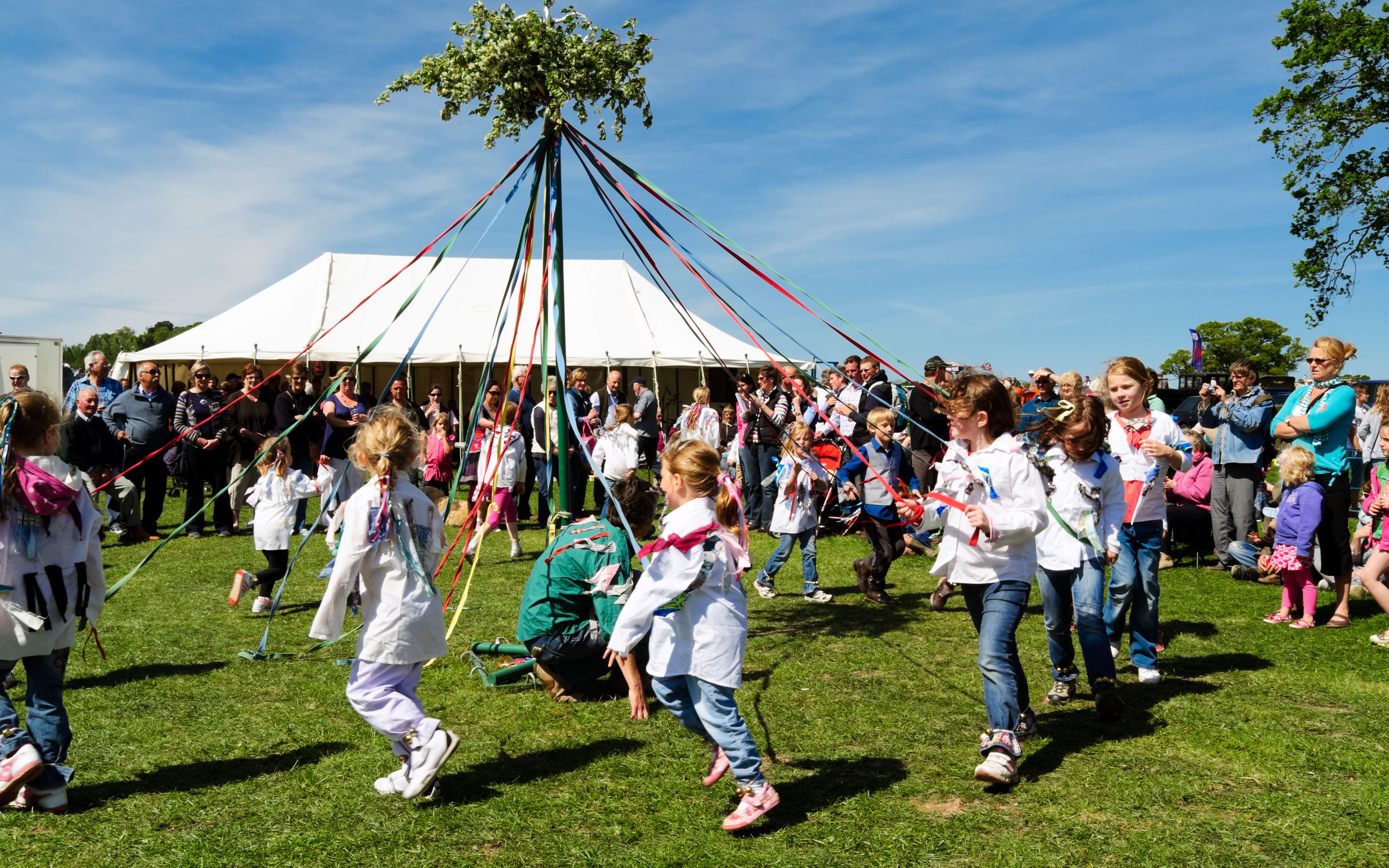 What is May Day? How is it celebrated around the world? When is the May bank holiday in 2018?